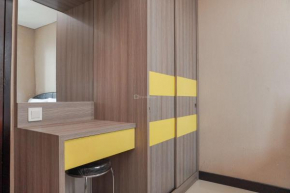 Comfy and Homey 1BR at Sky Terrace Apartment By Travelio